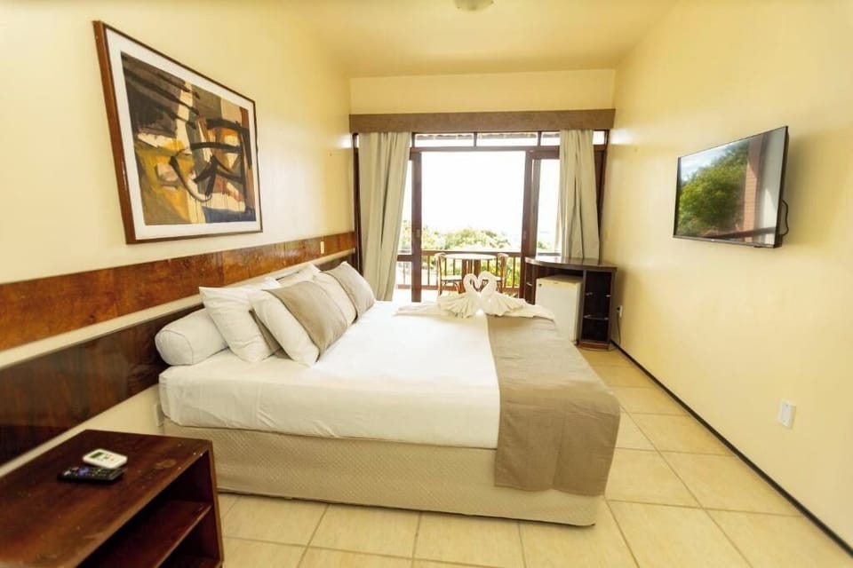 Suite, Garden View | Desk, blackout drapes, free WiFi, bed sheets