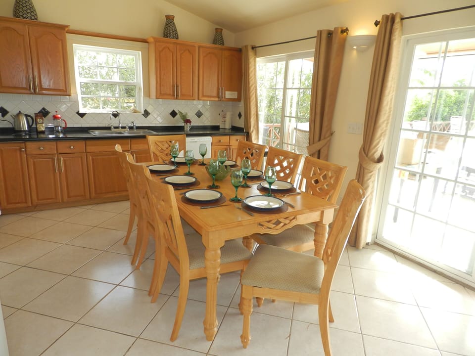 Fully Air-Conditioned Kitchen and Dining Area for 8 with Ceiling Fan