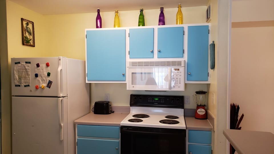 Plenty of cabinets full of all your eating and cookware!