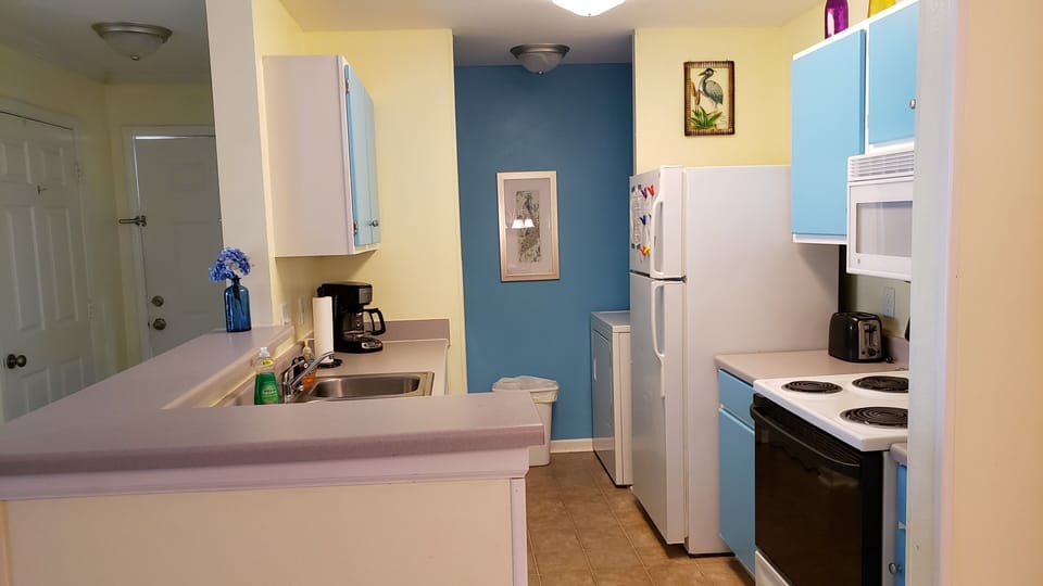 Its a very open floor plan from front door to kitchen, dining area & living room