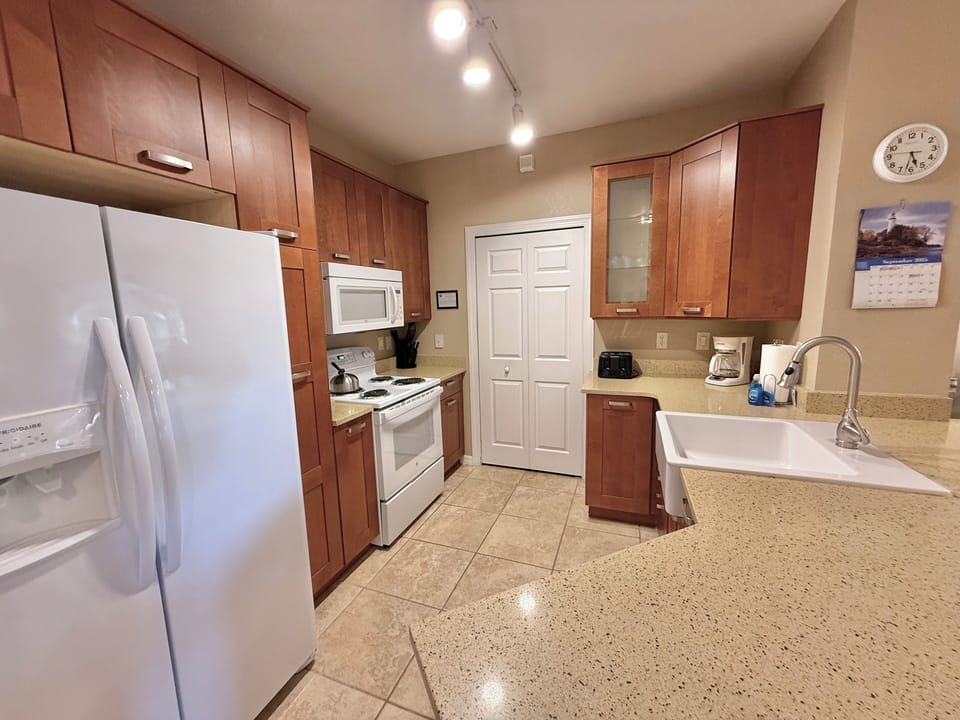 Microwave, Stove, Coffee Maker, Toaster, Pots, Pans, Dishes and so much more...