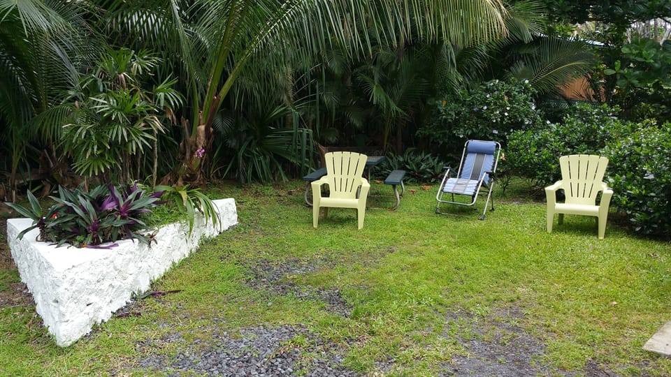Parking area near front door of cottage w/ ocean view