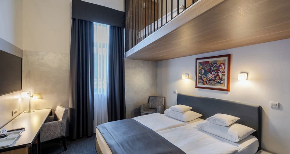 Family Loft, Multiple Beds | Premium bedding, down comforters, pillowtop beds, minibar
