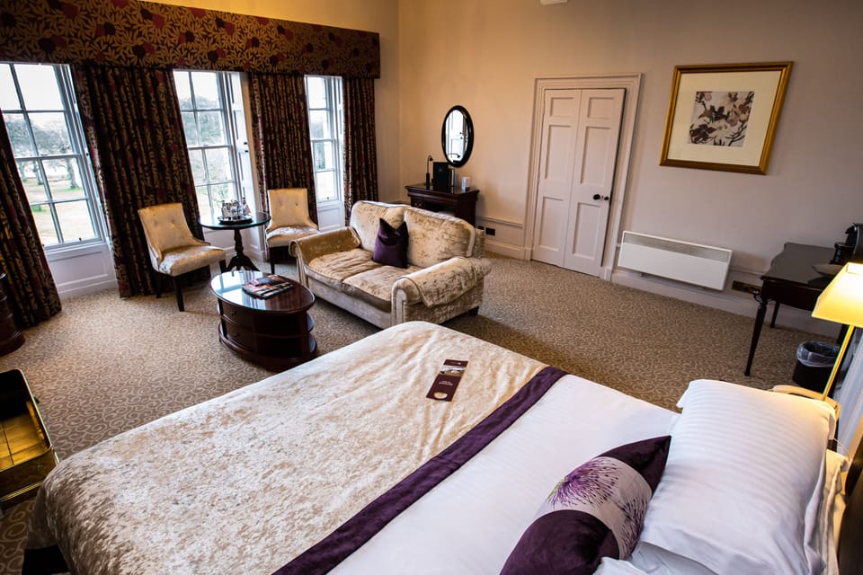 Premium bedding, in-room safe, individually decorated