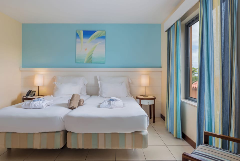 Suite, 2 Bedrooms | Minibar, in-room safe, desk, blackout drapes