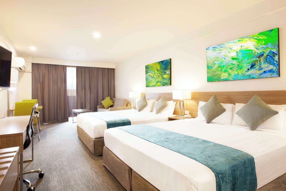Premium Deluxe Room, Balcony | In-room safe, desk, laptop workspace, blackout drapes