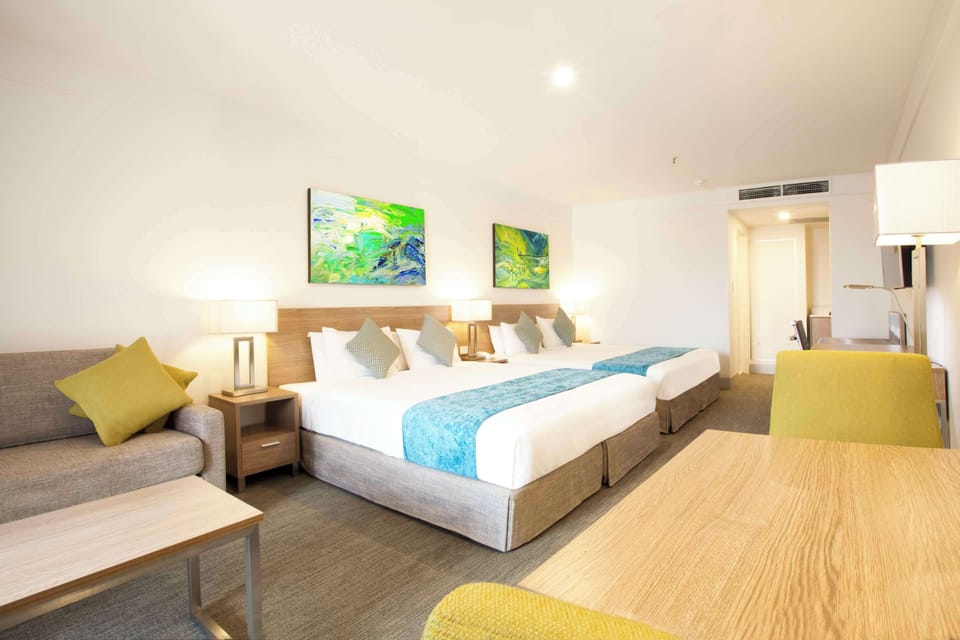 Premium Deluxe Room, Balcony | In-room safe, desk, laptop workspace, blackout drapes