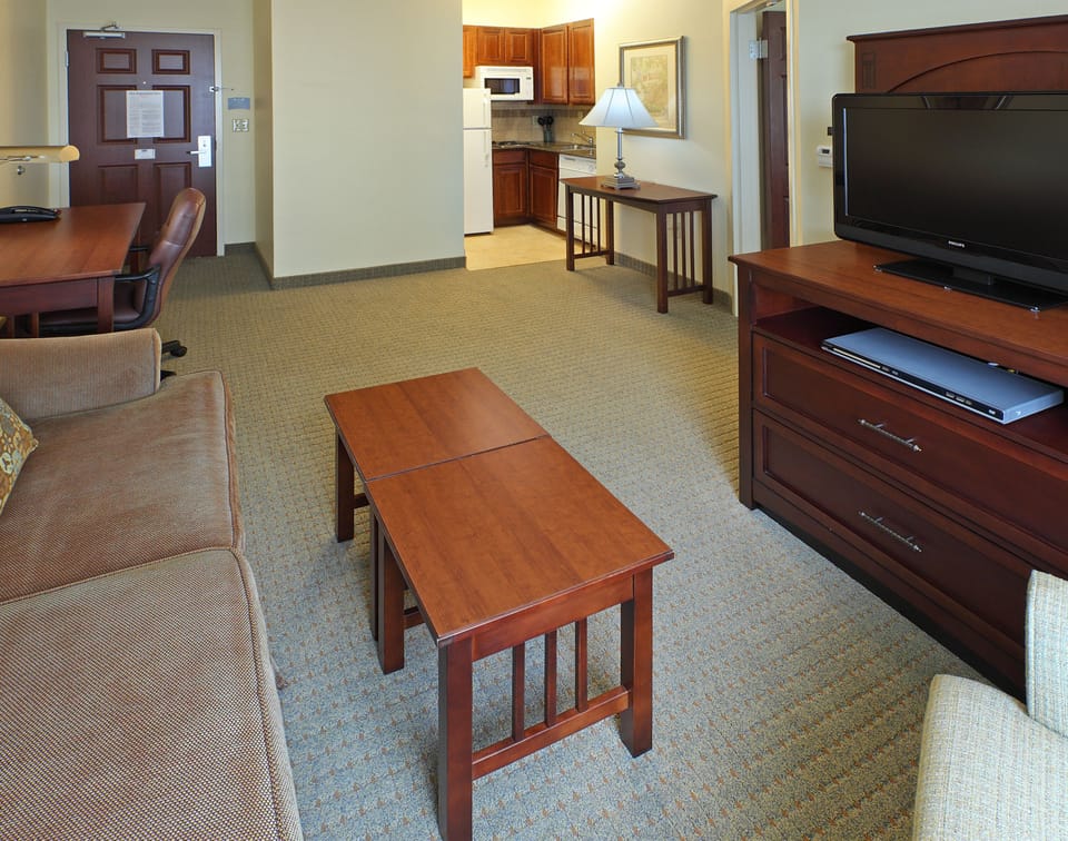 Desk, laptop workspace, blackout drapes, iron/ironing board