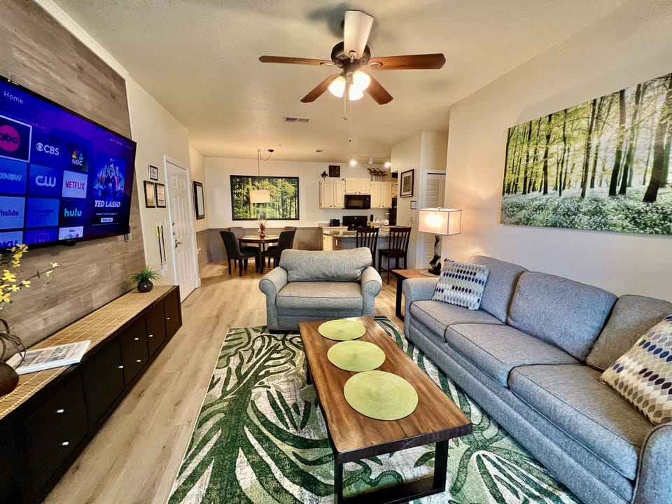 Spacoius Living Area with 65" Flat Screen Roku Tv