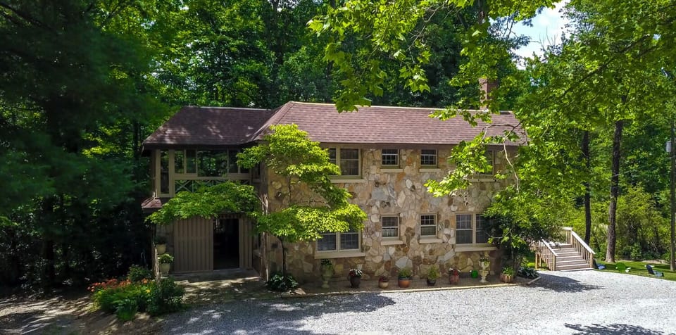 This gorgeous, freshly updated 1938 stone house welcomes you
