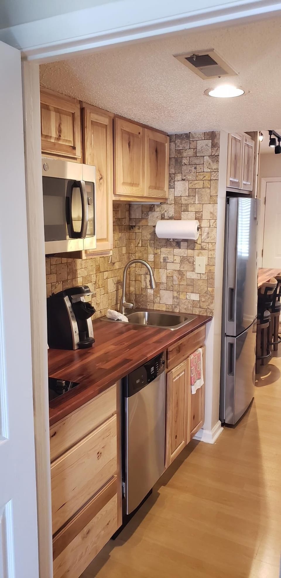 Kitchen now has dishwasher, micro-convection oven, full fridge, stove top