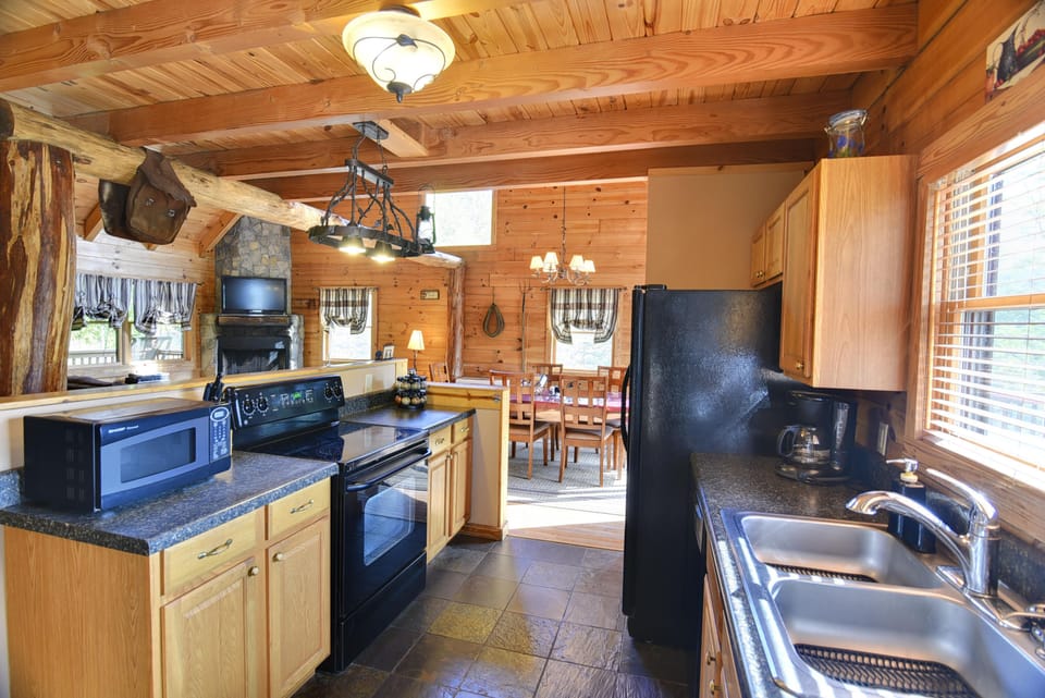 Kitchen is fully equipped to cook meals at the cabin.