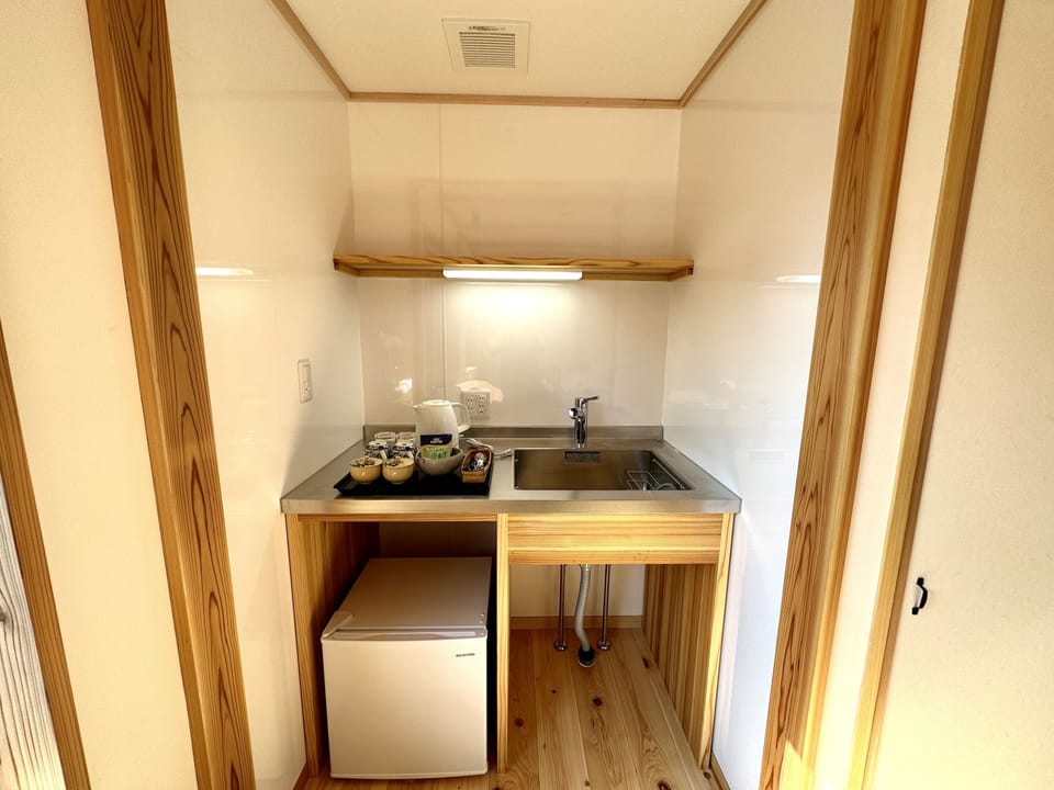 Superior Triple Room Ground Floor, Non Smoking | Private kitchen | Shared fridge, microwave
