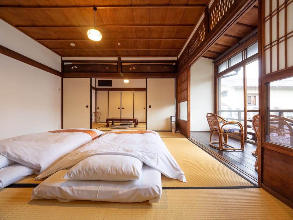 Japanese Style Family Room, Shared Bathroom | In-room safe, free WiFi, bed sheets