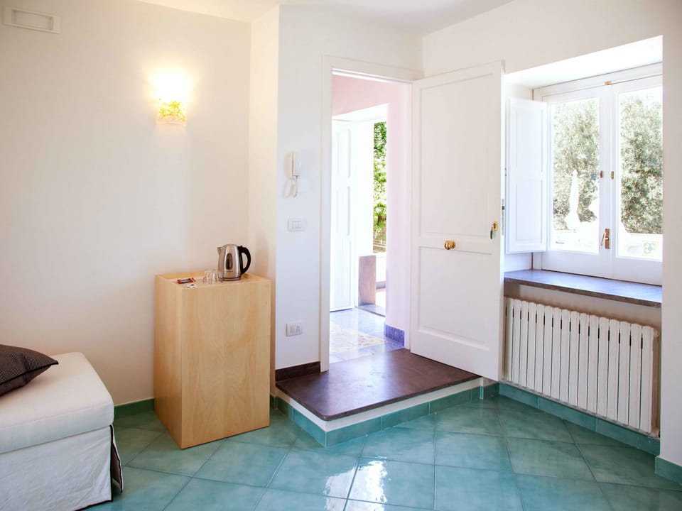 Suite, 2 Bedrooms, Sea View | Desk, soundproofing, cribs/infant beds, travel crib