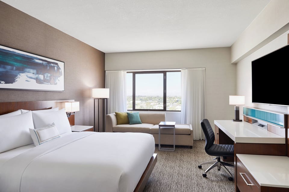 Hypo-allergenic bedding, pillowtop beds, in-room safe, desk