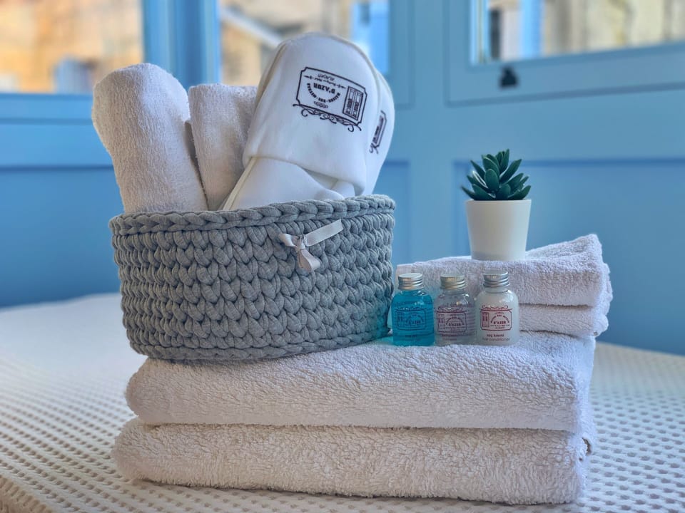 Shower, free toiletries, hair dryer, slippers