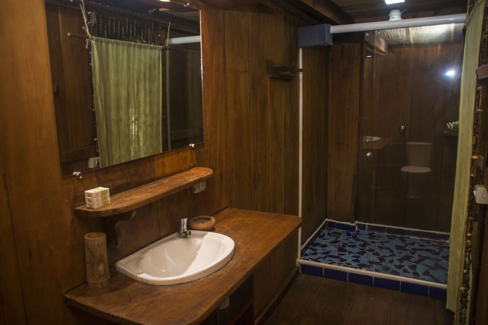 Quadruple Room (Balcony) | Bathroom | Shower, free toiletries, towels