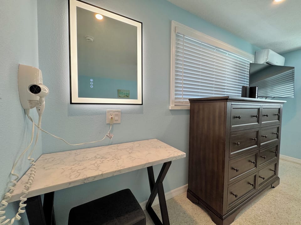 Desk vanity with touch light mirror and hairdryer
