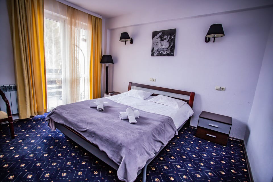 Twin Room (Caters to guests age 55 and up) | Desk, free WiFi