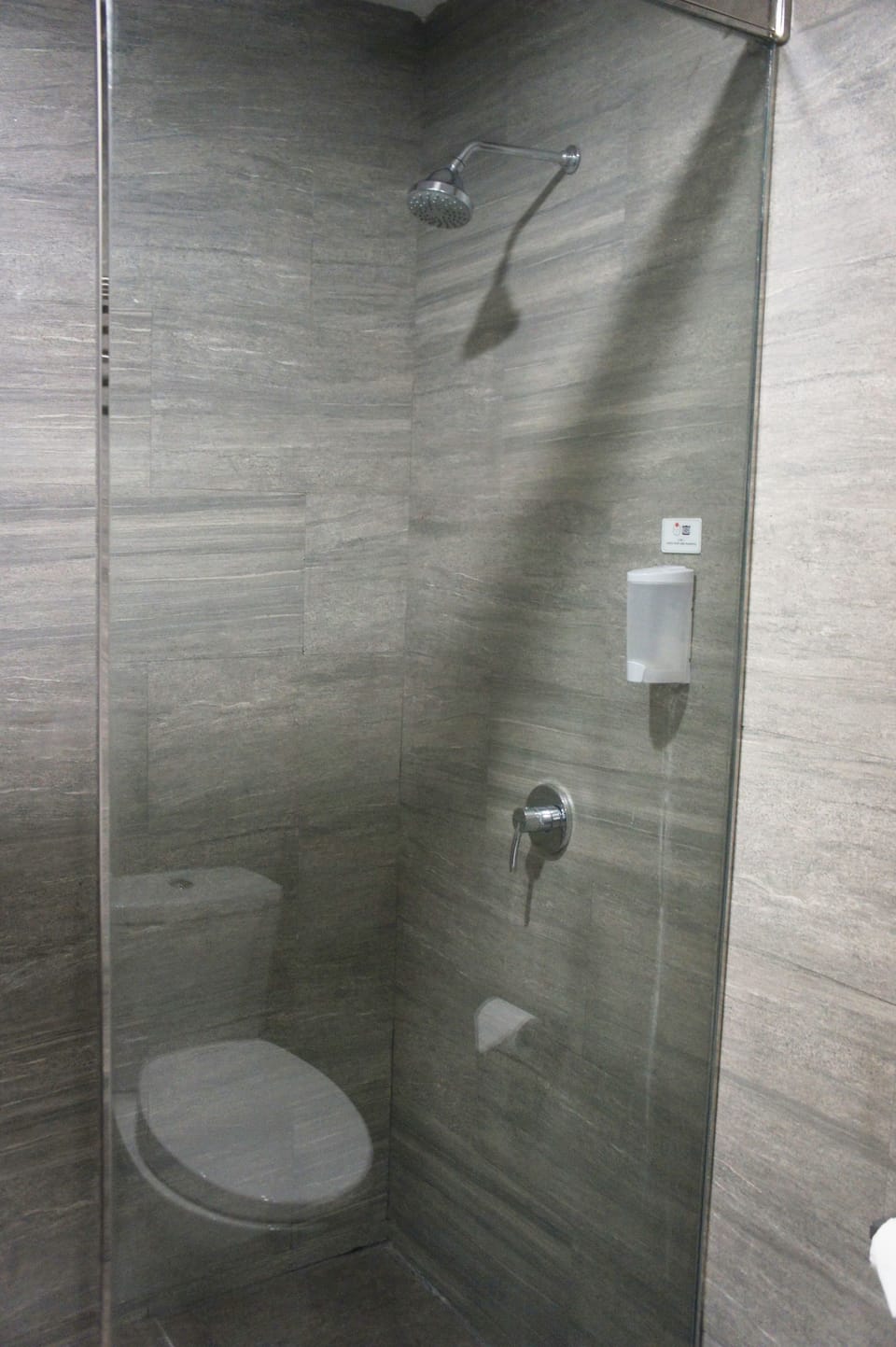 Shower, free toiletries, hair dryer, slippers
