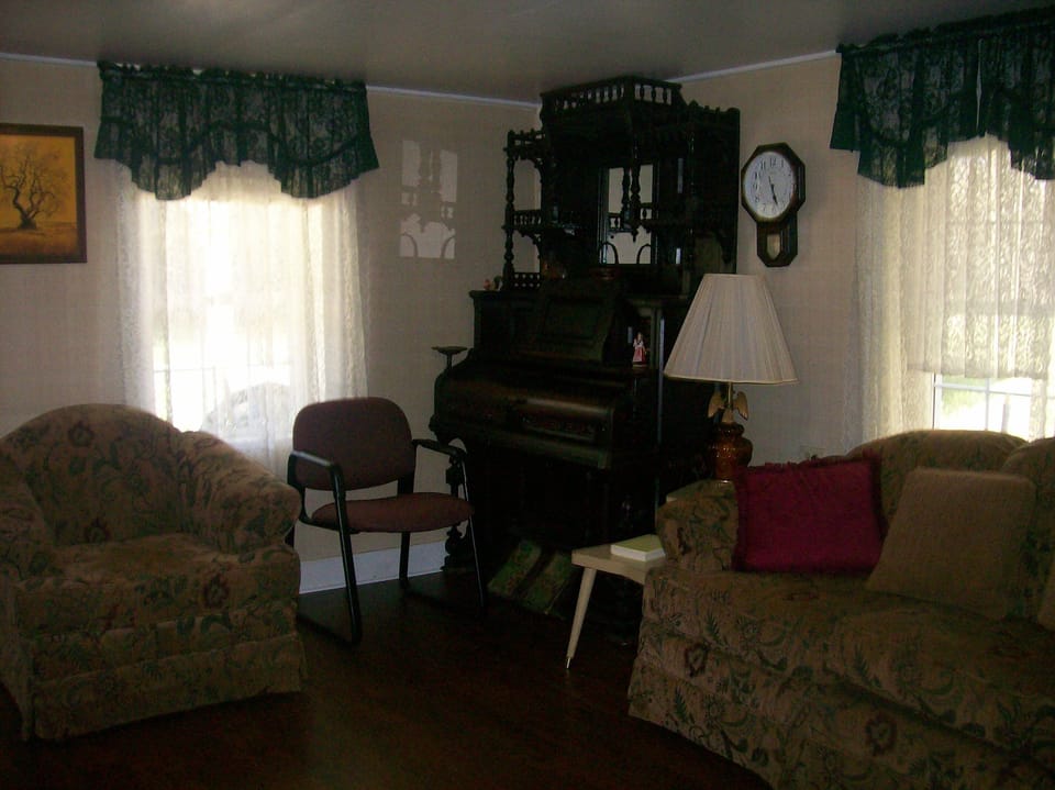 living room with grandmas old organ, she played.