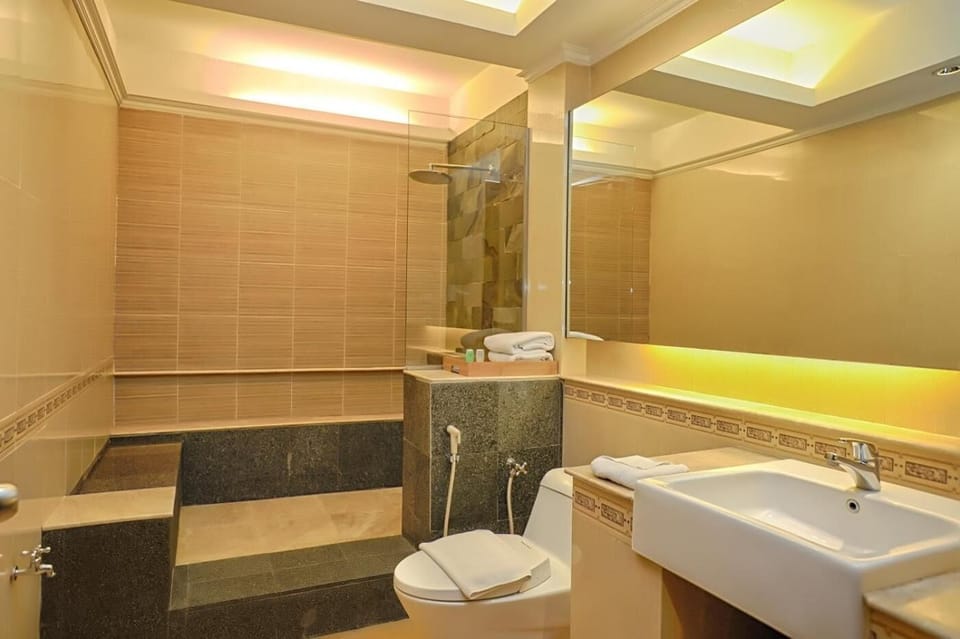 Shower, free toiletries, slippers, towels