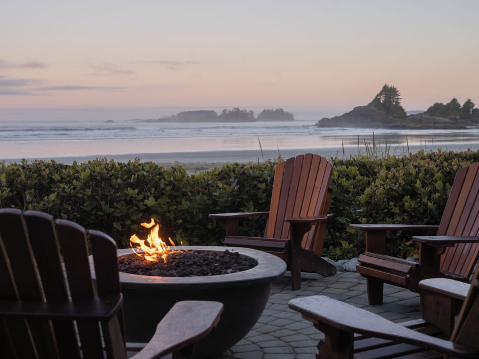 On the beach, surfing