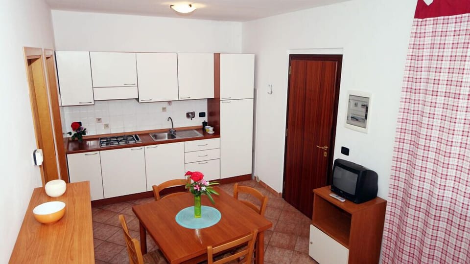 Apartment, 1 Bedroom | Living area | TV