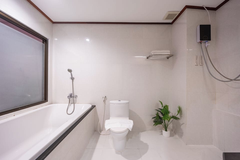 Rainfall showerhead, free toiletries, hair dryer, towels
