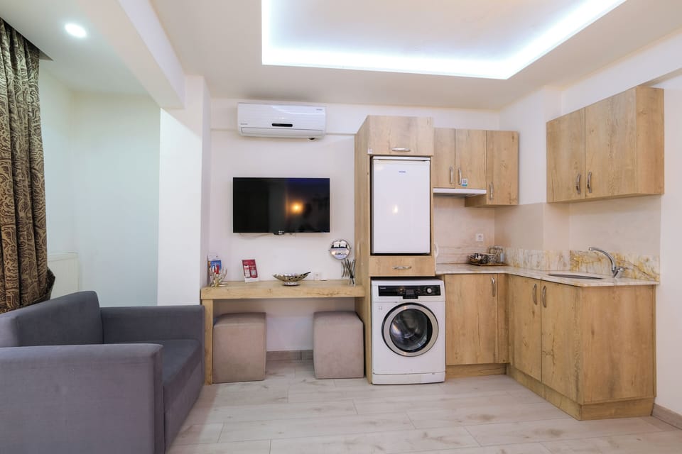 Family Quadruple Room | Premium bedding, minibar, in-room safe, individually decorated