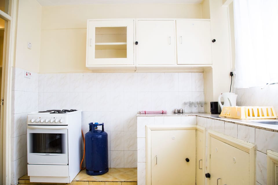Apartment, 2 Bedrooms | Private kitchen | Full-size fridge, microwave, oven, stovetop