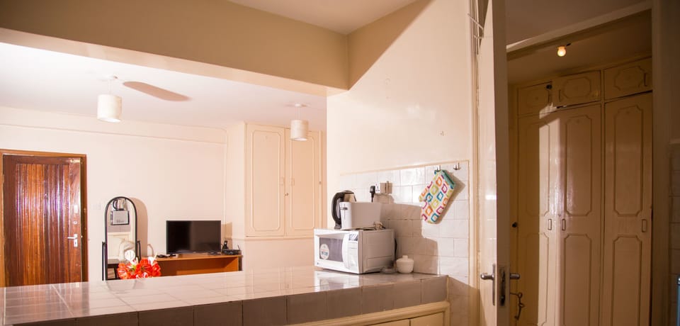 Standard Studio, Kitchen | Private kitchenette | Full-size fridge, microwave, oven, stovetop
