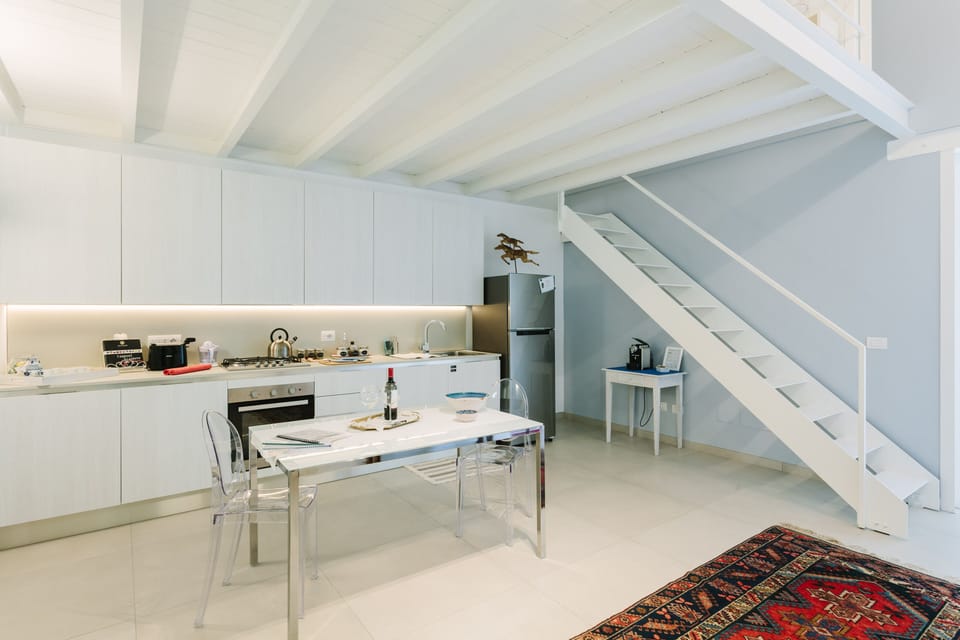 
In the kitchen: fridge, freezer, oven, burners,toaster, juicer, coffee machine