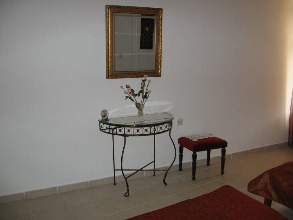 The bedroom's mirror on the wall