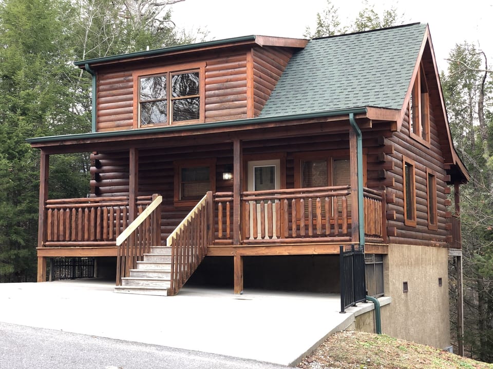 Your cabin as seen from the quiet street, other angle. Lot next door is cleared