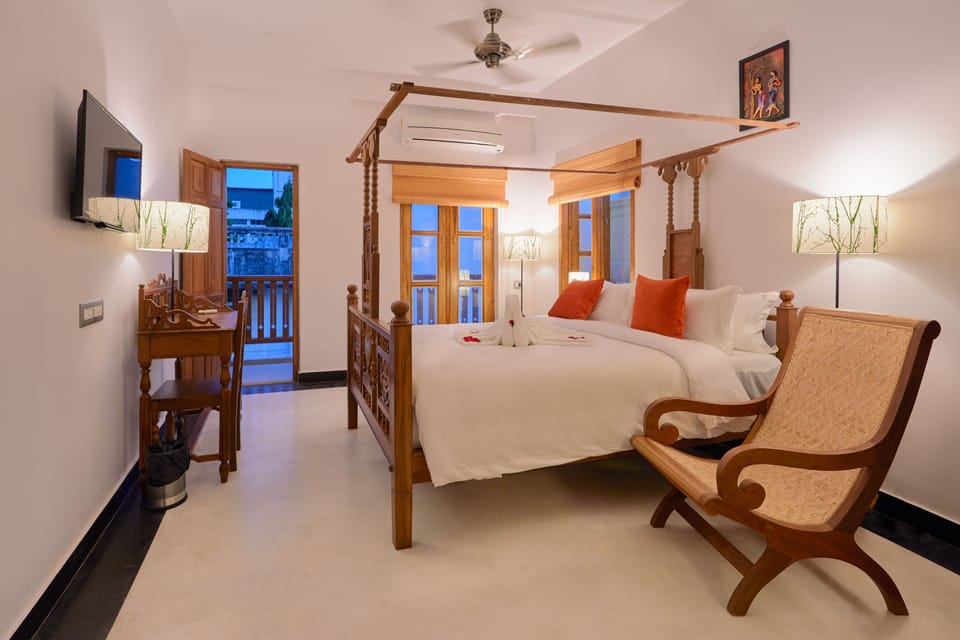 Deluxe Double Room, Balcony, City View | Minibar, in-room safe, desk, soundproofing