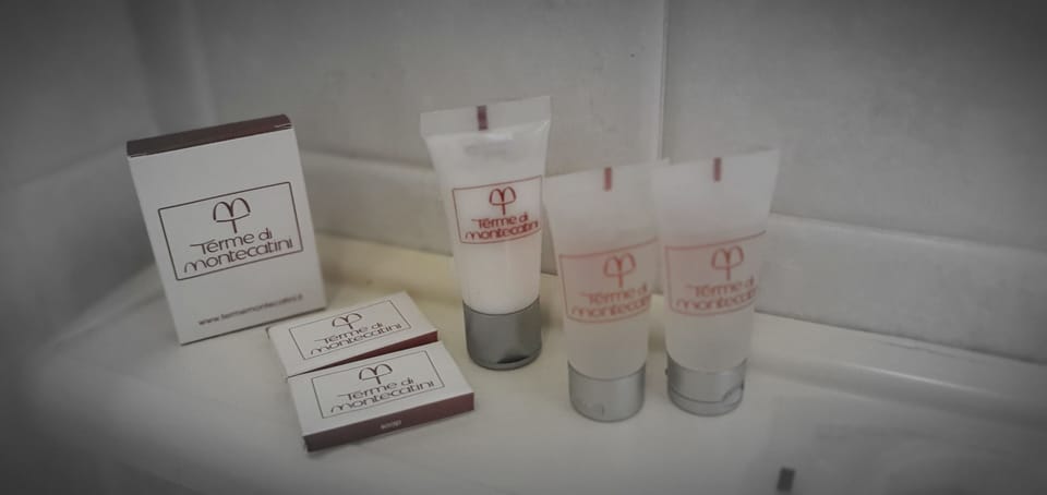 Superior Room | Bathroom | Shower, rainfall showerhead, hair dryer, towels