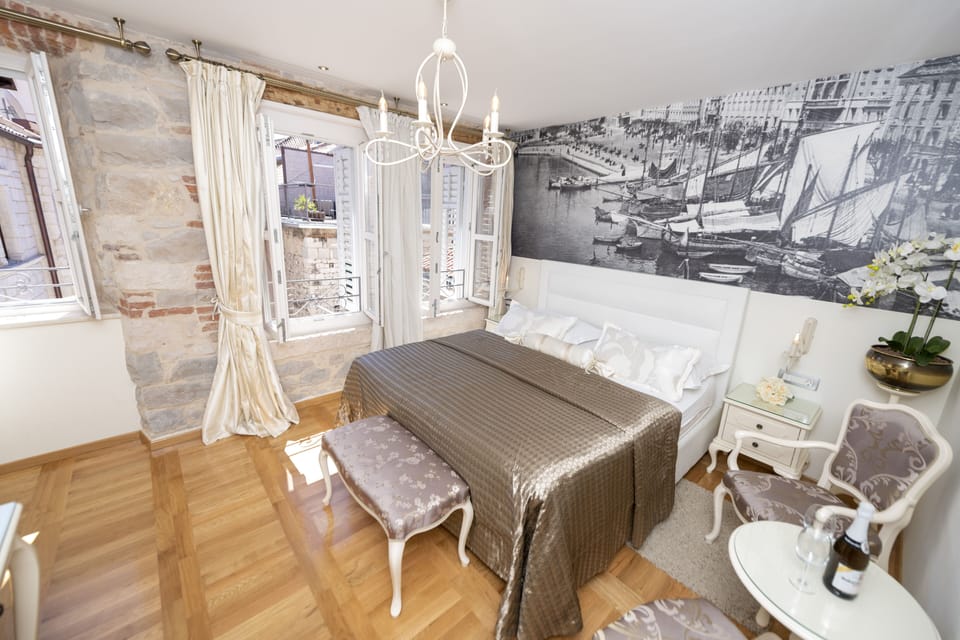 Deluxe Room, 1 King Bed | Premium bedding, minibar, in-room safe, individually decorated