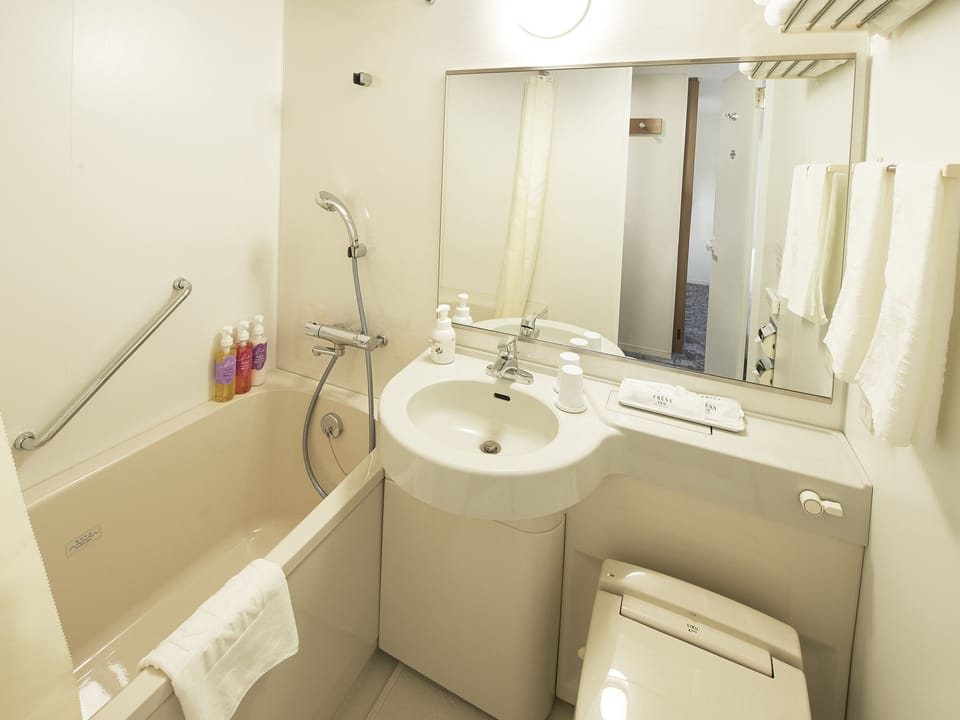 Shower, free toiletries, hair dryer, slippers