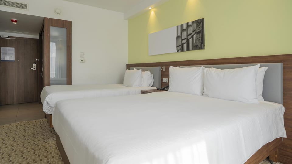 Room, Multiple Beds | In-room safe, desk, iron/ironing board, free WiFi