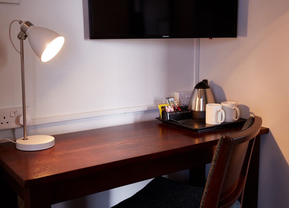 Desk, blackout drapes, iron/ironing board, free WiFi