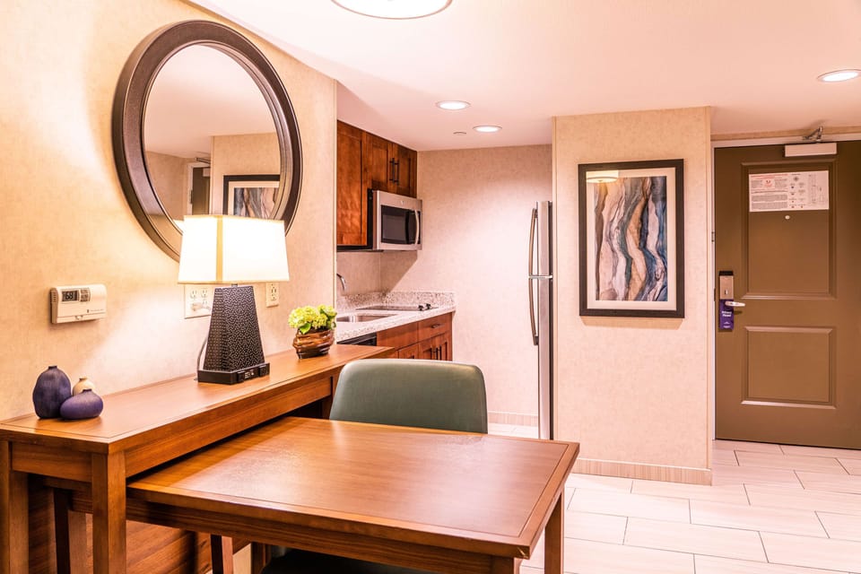 Desk, laptop workspace, blackout drapes, soundproofing
