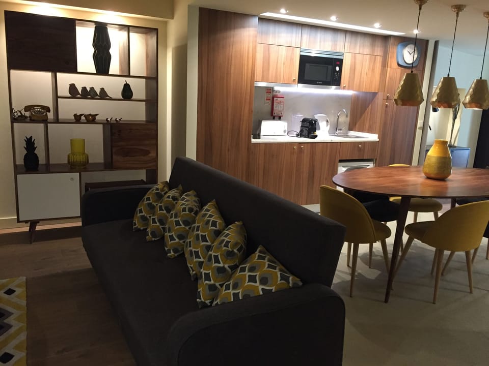 Apartment, 2 Bedrooms, River View | Living area | 109-cm flat-screen TV with cable channels, TV