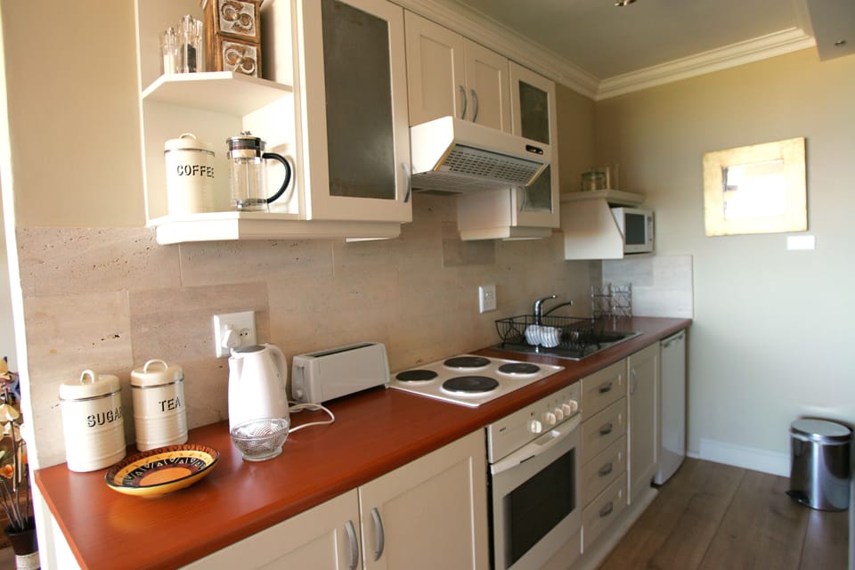Deluxe Sea Facing Suite with Air Con | Private kitchen | Fridge, coffee/tea maker, electric kettle