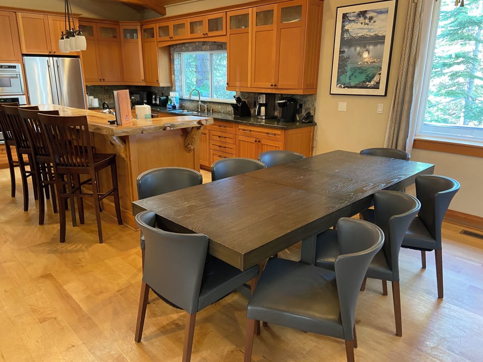 Dining Room set for 8, bar seating for overflow, and card table optional. 