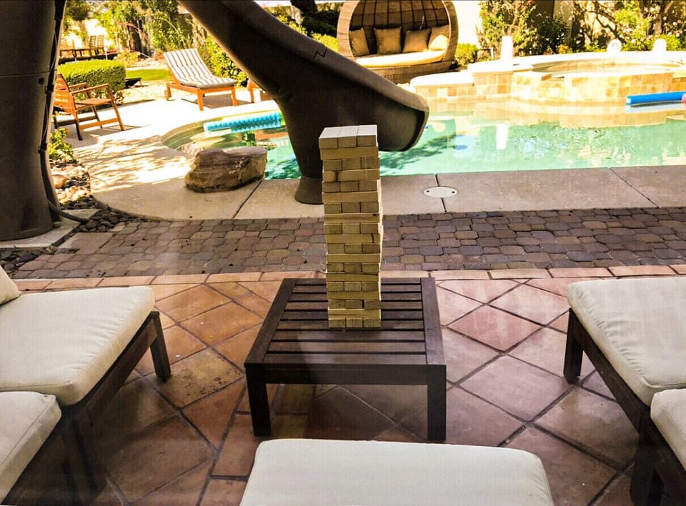 Get ready for some giant-sized fun in our backyard! Gather your friends and family to play an exciting game of Giant Jenga, where you`ll test your balancing skills and strategize to keep the tower from tumbling down.