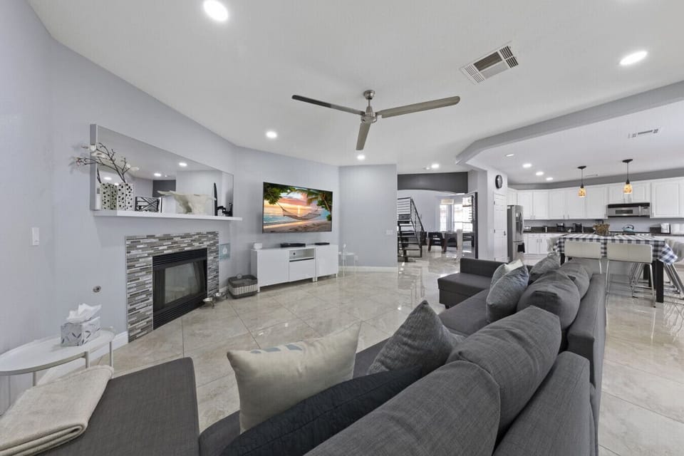 Watch your favorite shows on our HD LG 75 Inch TV with Samsung Sound Bar (Both sofas open up to a full size sofa bed)