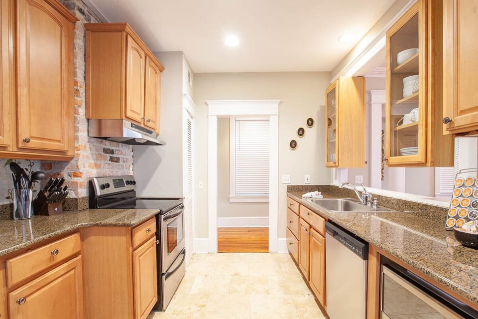 Updated kitchen with granite counter-tops and stainless appliances. 