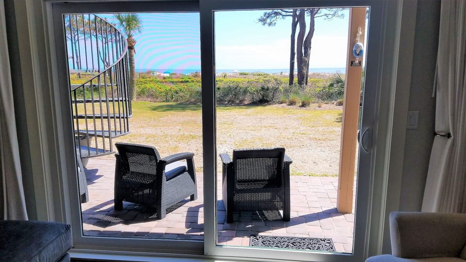 View of the beach from the living room and patio.